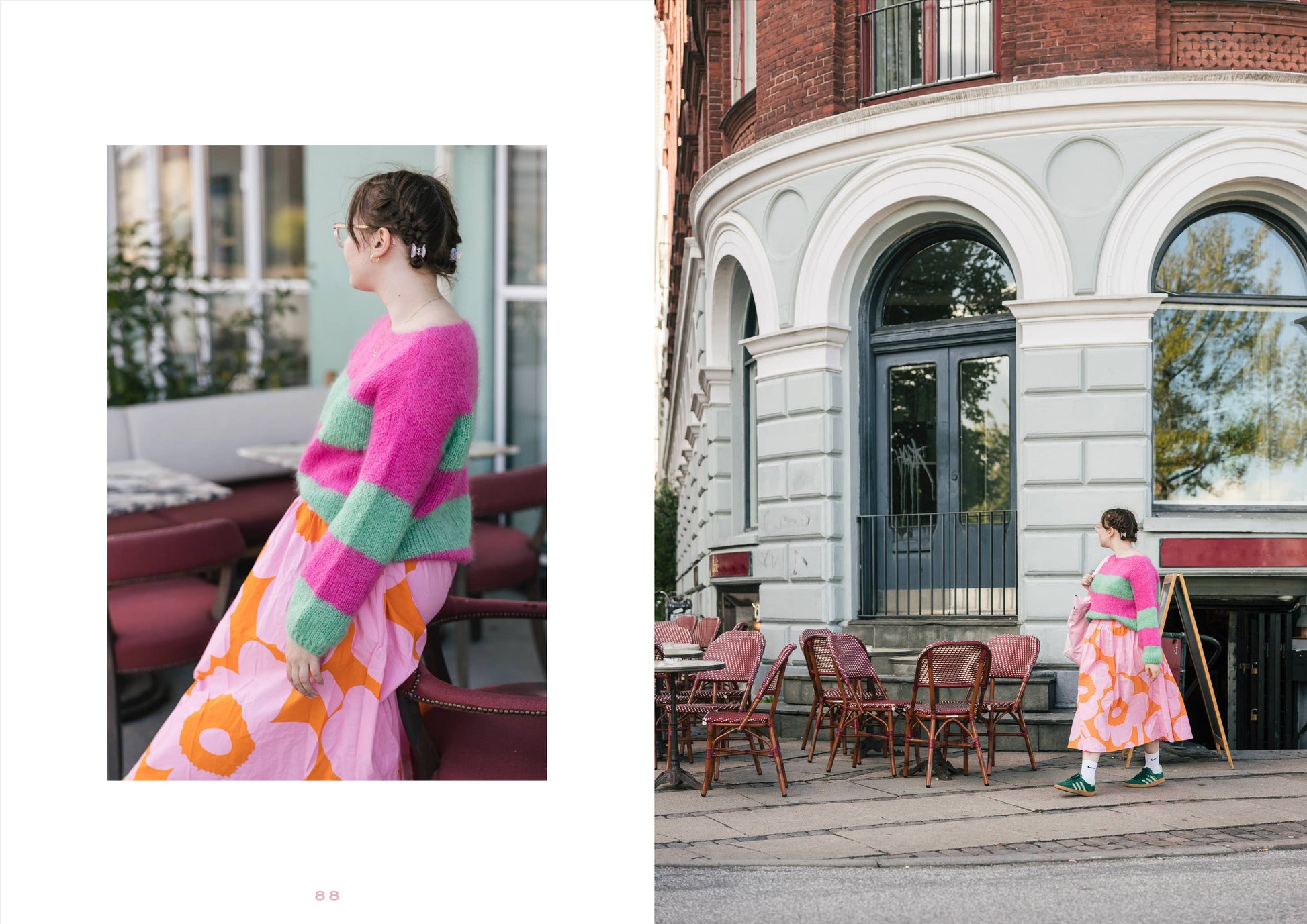 Woman in colorful outfit standing on a street with a building in the background