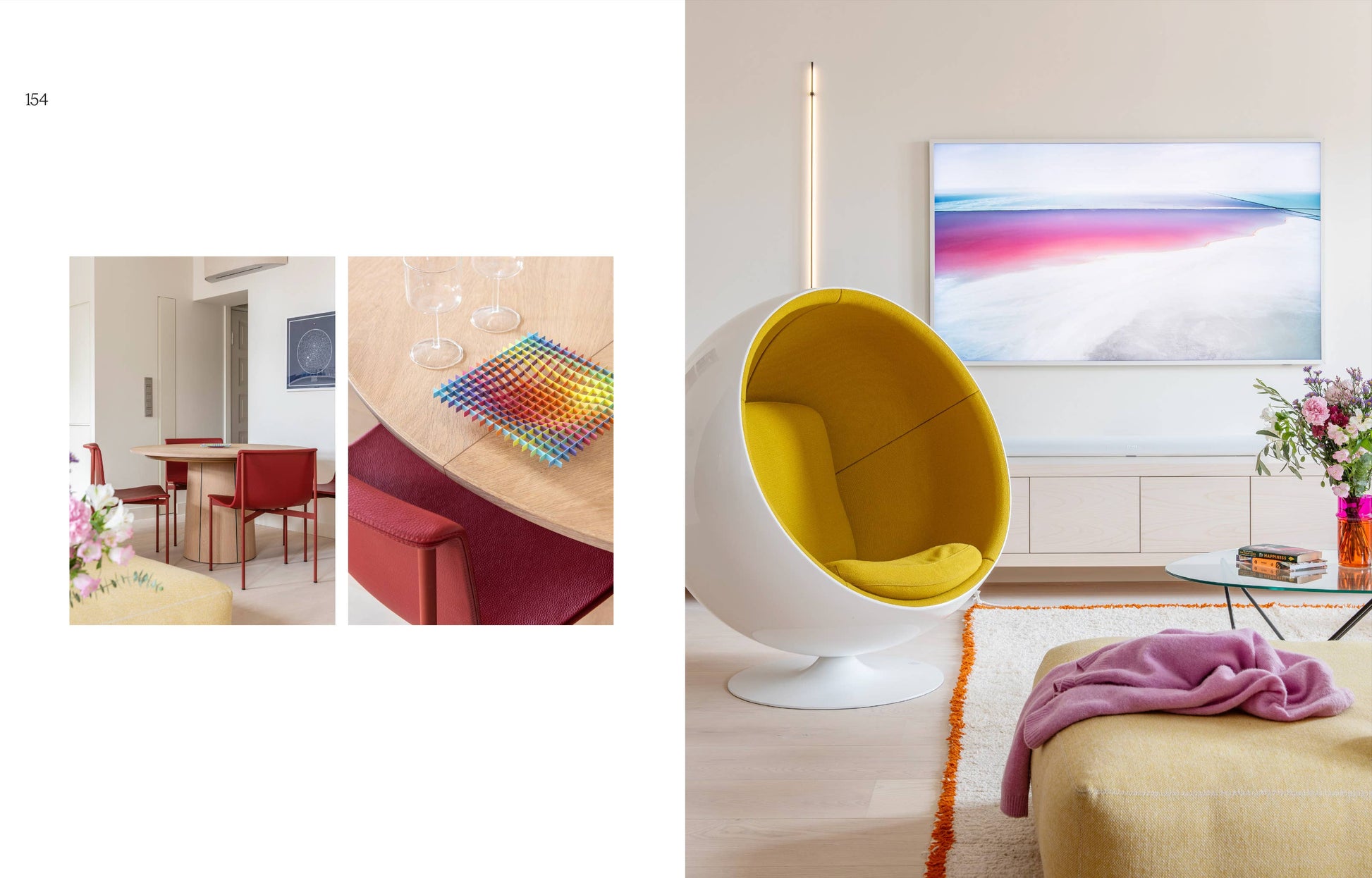 Modern living room with a yellow chair, colorful rug, and a television displaying a rainbow pattern.