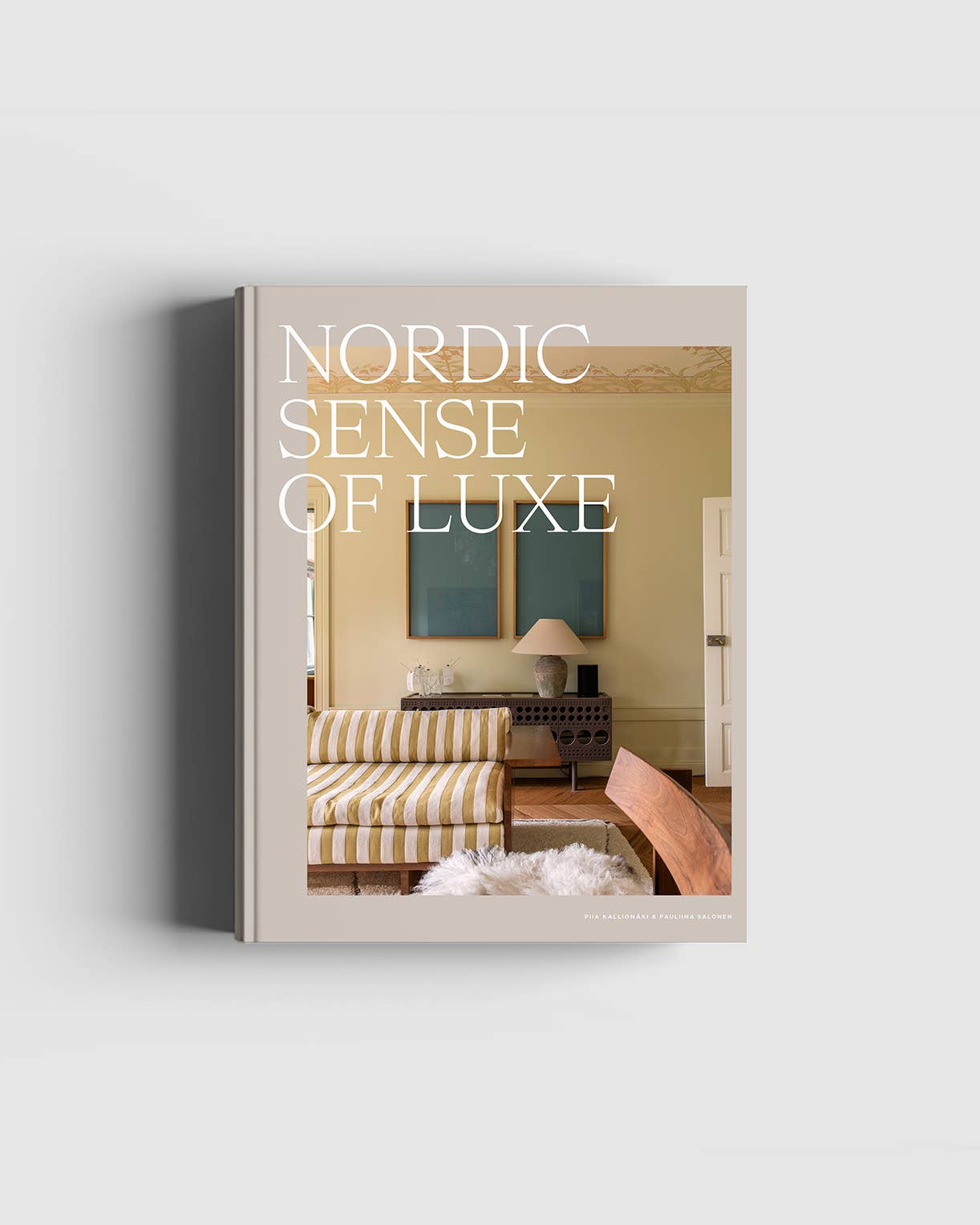 Book titled 'Nordic Sense of Luxe' with a photograph of a living room on the cover.