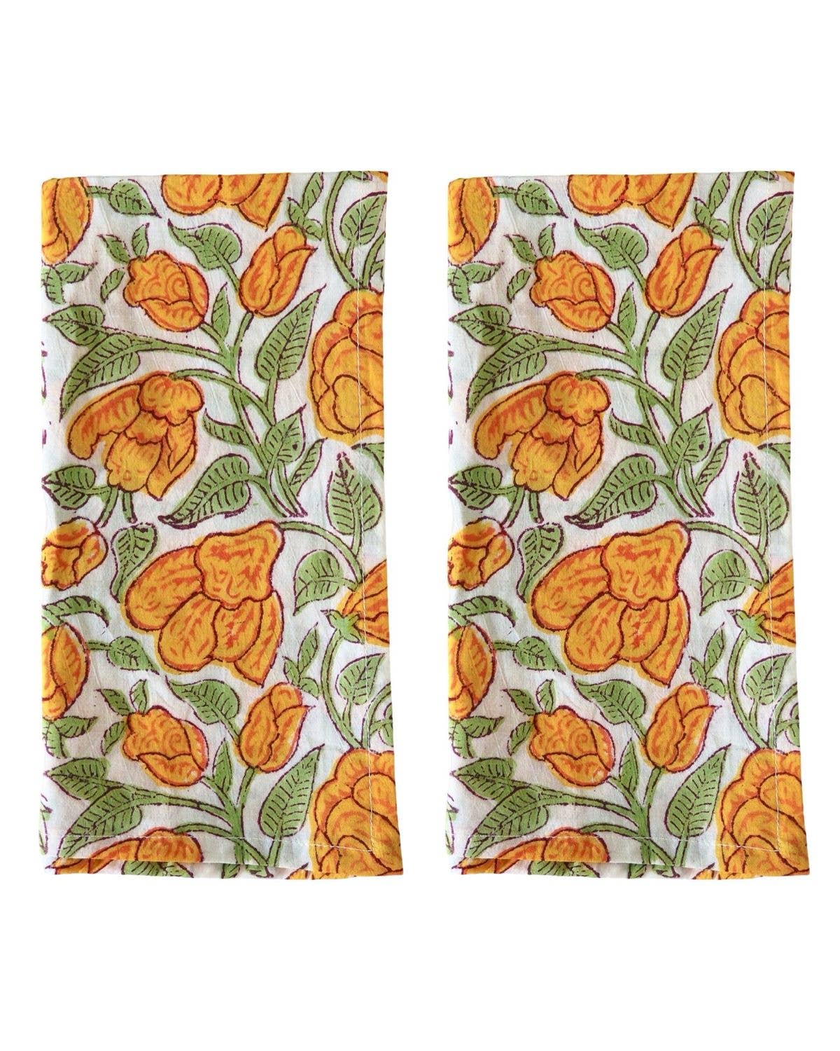 TSet of 2 floral hand-block printed cotton napkins with orange and yellow flowers on a white background for Spring and Autumn table decor, Matisa Deco Ireland. 