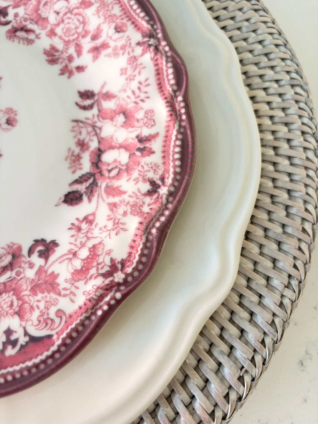 Close-up Our Faustine Dessert Plates in Pink Porcelain, paired with our White Rattan Charger Plates, have been featured in
Living North Magazine – February 2026,