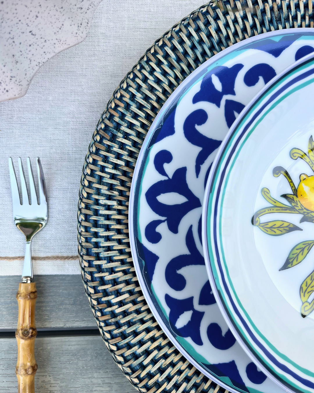 Close-up of Excelsa Amalfi neutral-toned dinner plate showing high-gloss porcelain finish.