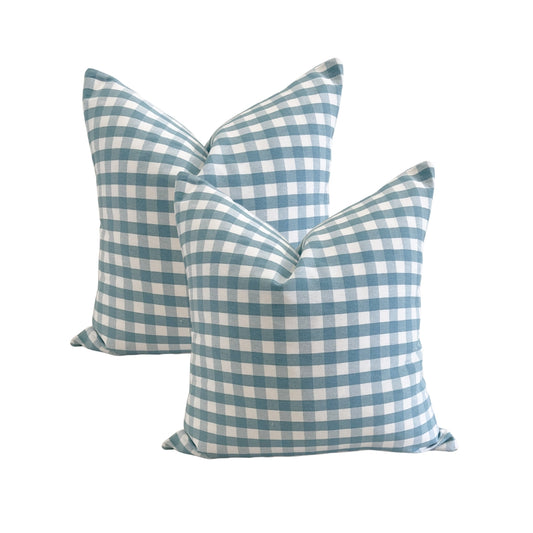Set of 2 aquamarine and white gingham checkered cushion covers with a water-repellent finish.