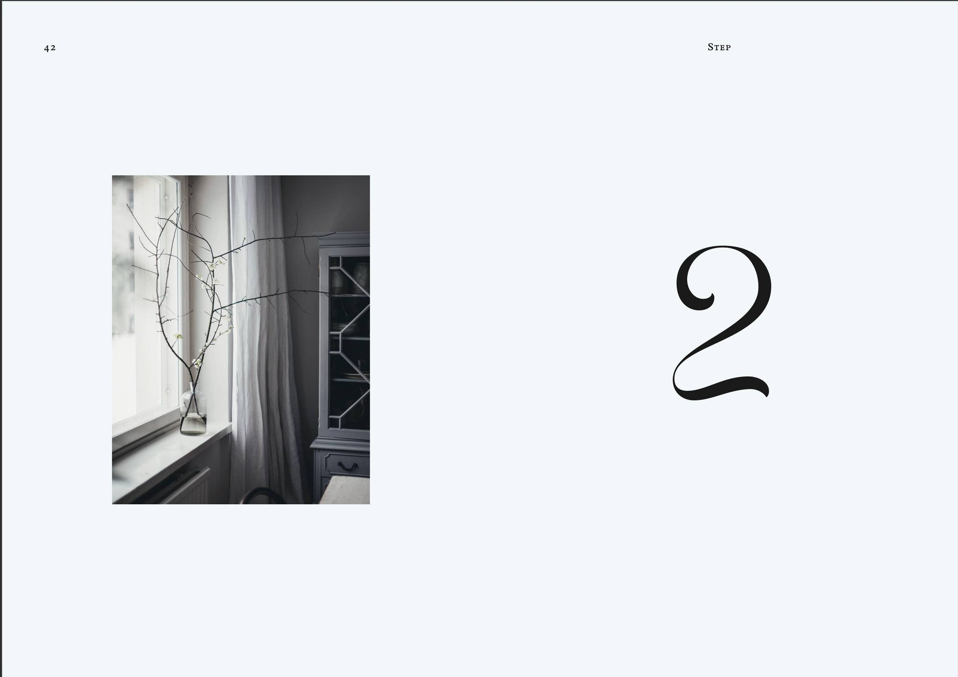 Page from a book or magazine with a number '2' and a small inset image of a room with a window and plant.