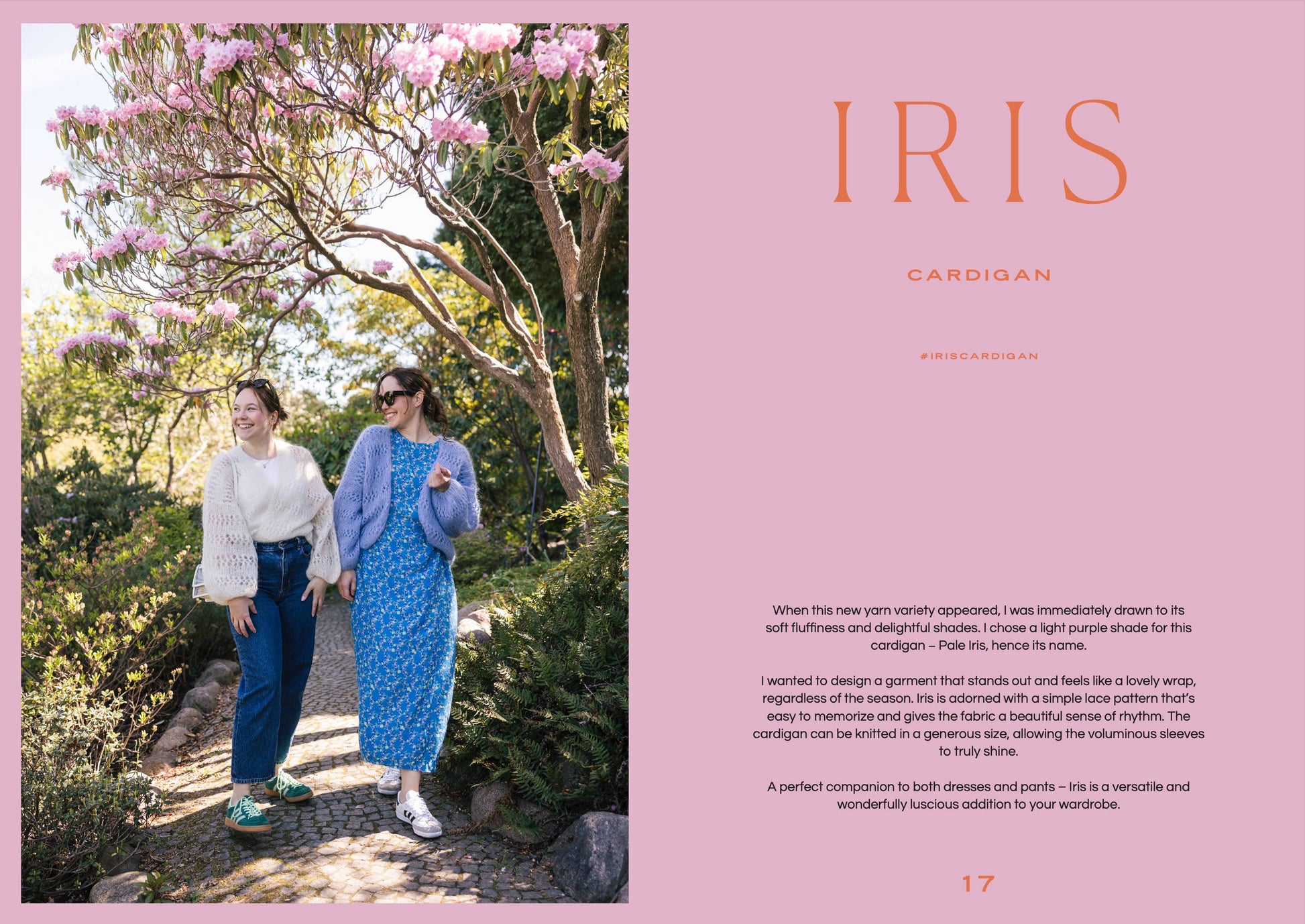 Two women walking outdoors with cherry blossoms, featuring the 'Iris' cardigan.