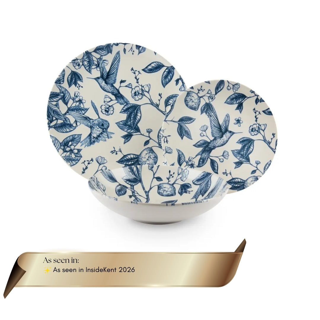 Excelsa Colibri 12-piece ceramic dinnerware set with blue hand-painted bird accents, as seen in InsideKent Magazine.