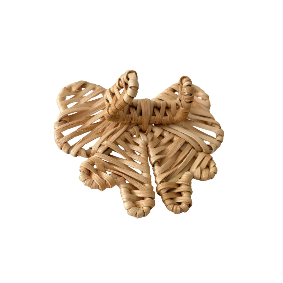Back detail of the handwoven Double Bow Rattan Napkin Ring showing its natural rattan craftsmanship