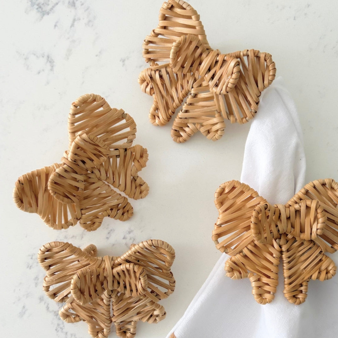 Handwoven Double Bow Rattan Napkin Rings showing the natural variations and unique character of each artisan-made piece