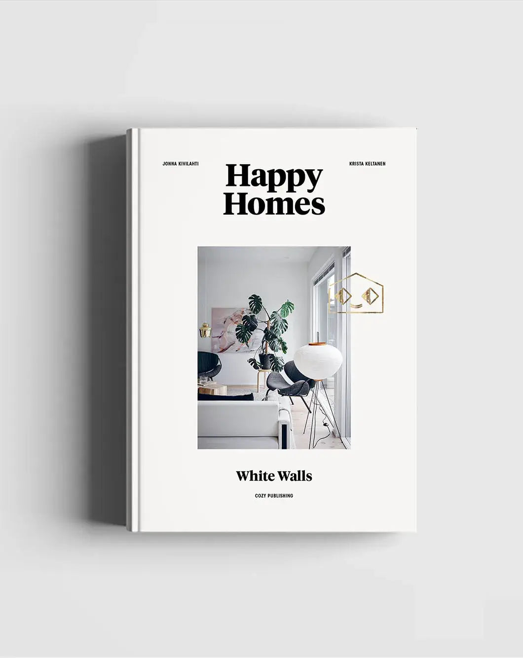 Book titled 'Happy Homes' with a cover featuring a modern interior design on a light gray background.
