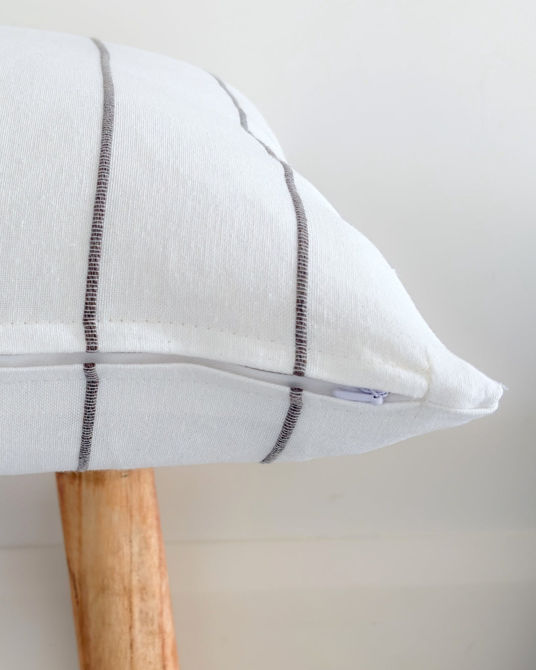 Durable zipper closure detail on a high-quality flax-colored jacquard cover.