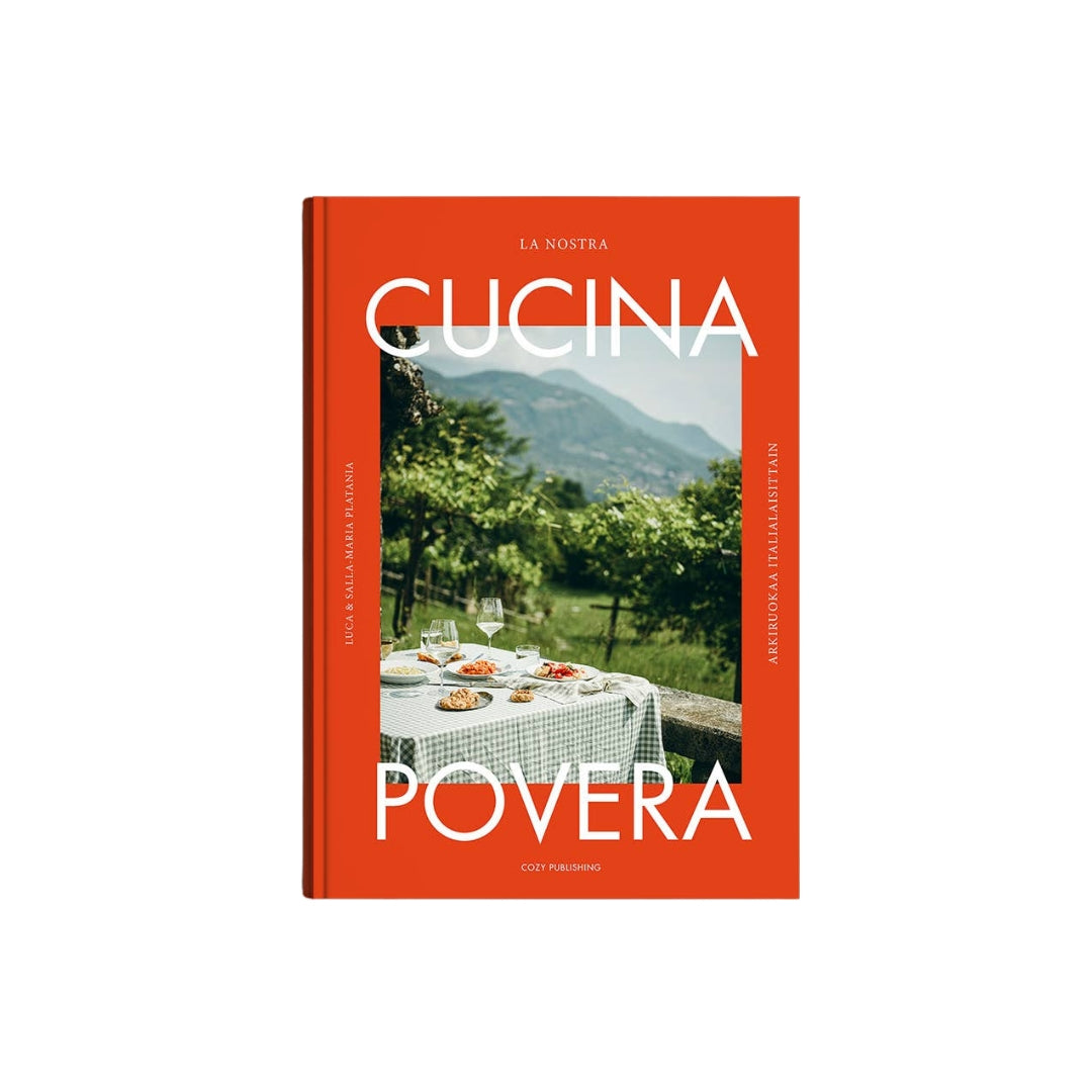 The cookbook 'La Nostra Cucina Povera' by Giulio Majoli and Silvia Rombaldi, published by Conti Panini. The book features a vibrant orange-red cover with a central photograph of a vineyard and dining table, and bold white typography.