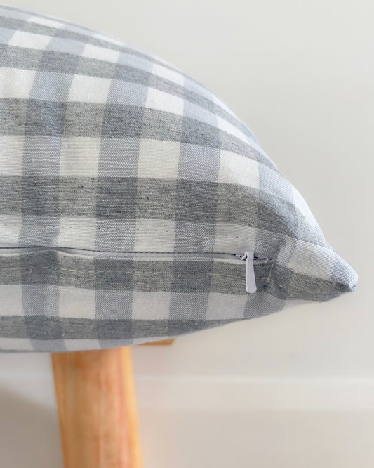 Premium hidden zip on light grey gingham indoor-outdoor cover.