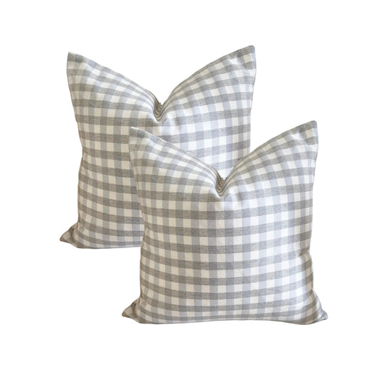 Set of 2 light grey gingham water-repellent cushion covers.