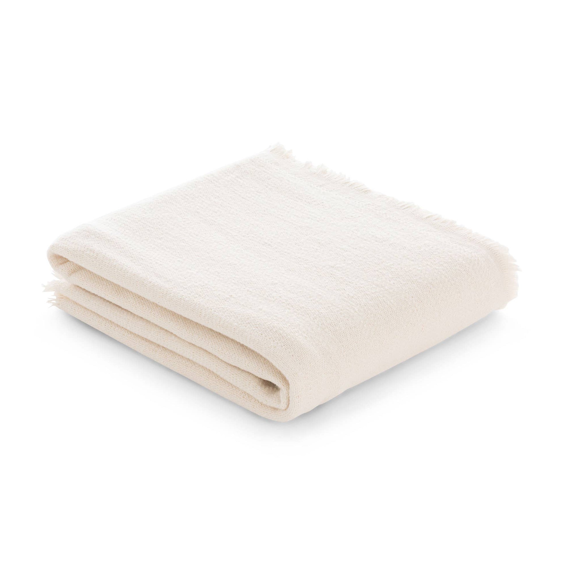 NATURE artisan fringed throw in Ecru, a soft crude and off-white natural cotton blanket.