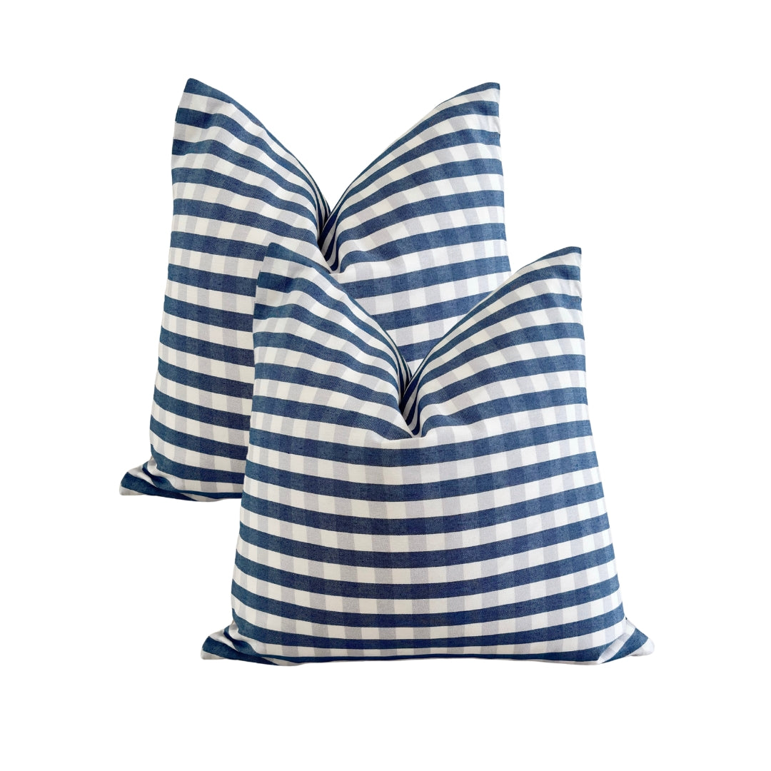 Pack of 2 navy blue Vichy check water-repellent cushion covers 45x45 cm on white background made in Spain.