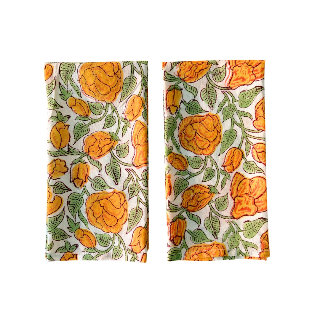 Press featured set of 2 floral hand-block printed cotton napkins in vibrant orange and yellow as seen in Absolutely Magazines Spring edition.