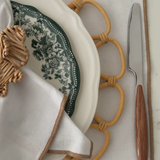 Handwoven Double Bow Rattan Napkin Rings styled for an elegant natural table setting by Matisa Deco.
