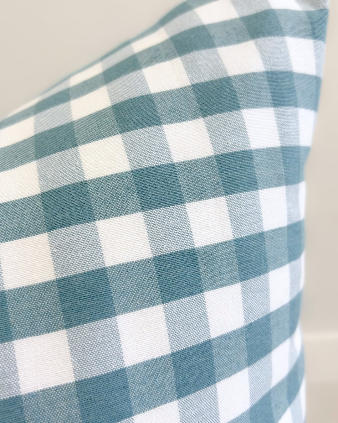 Close-up of the premium hybrid weave showing the real cotton soft feel of the aquamarine gingham fabric.