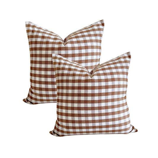 Set of 2 brown gingham water-repellent cushion covers.