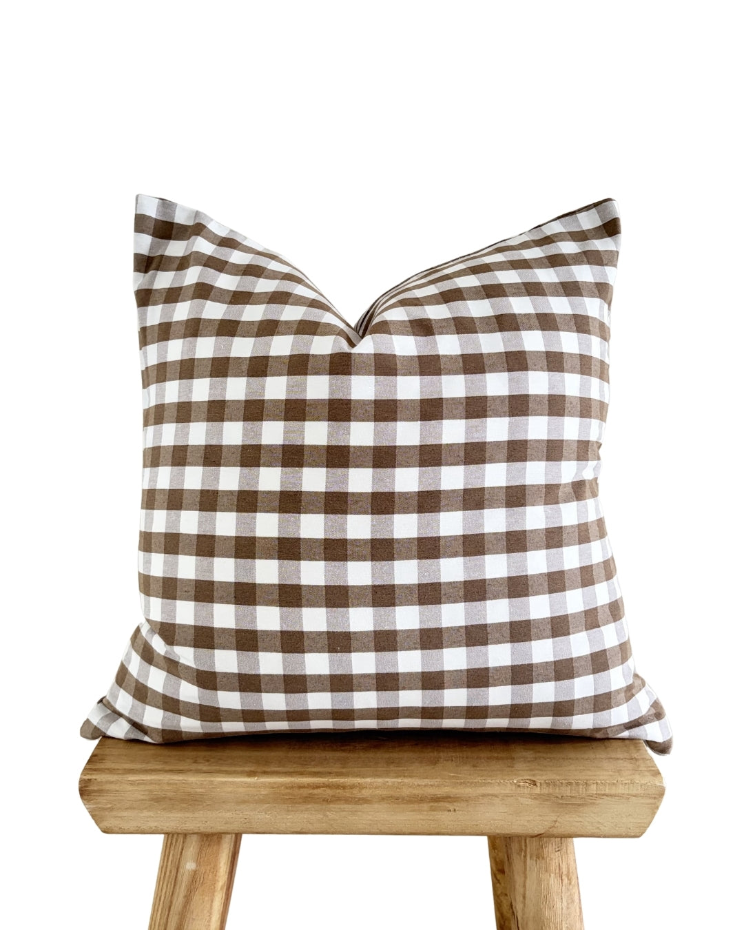 Brown rustic check cushion cover for country-style interiors.