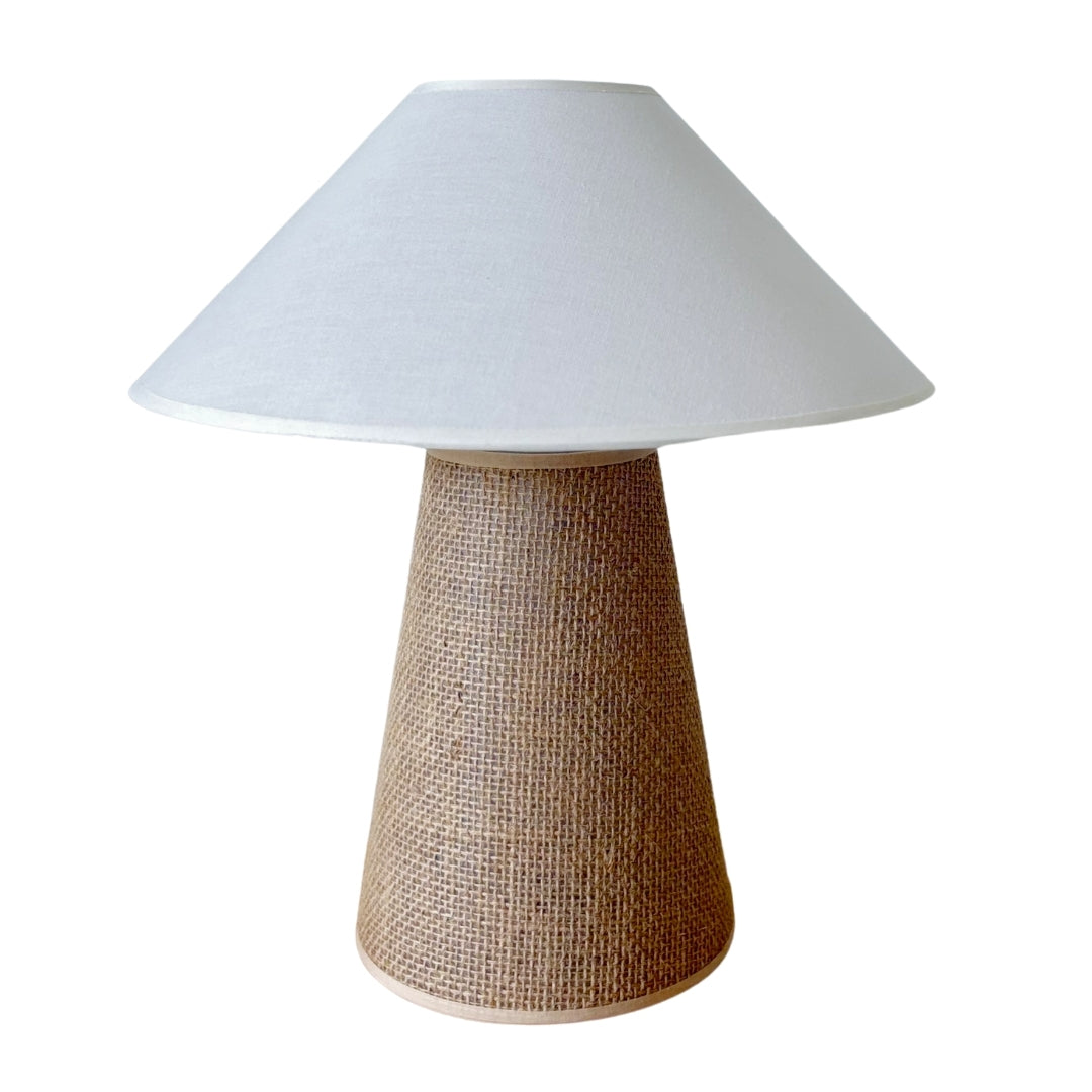 side profile view showing the geometric silhouette and balanced proportions of the Sculpt sisal and cotton lamp.