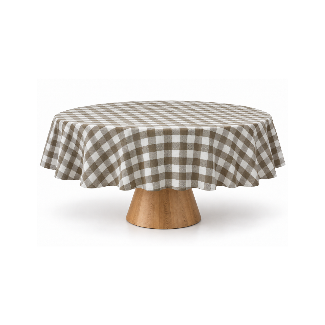 Taupe gingham round tablecloth styled on a wooden pedestal dining table